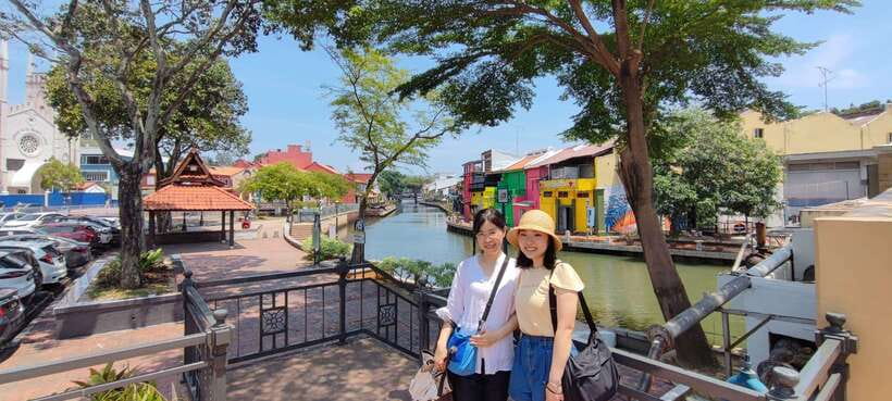 Kuala Lumpur Discovery: Shared Group Tour from Port Klang - Batu Caves: steps, statue, and the rules for what to wear